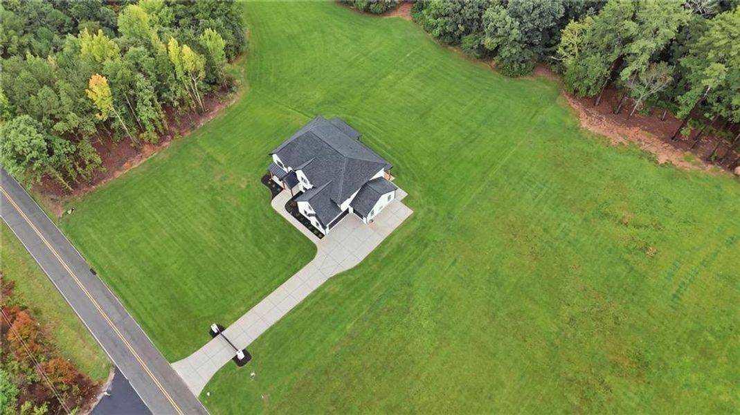 Front exterior of a new home in , Jefferson, GA, highlighting curb appeal (Image 35).