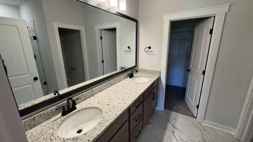 Furnished interior view inside a new home in The Greens at Legacy Townhomes, Springfield (Image 8).