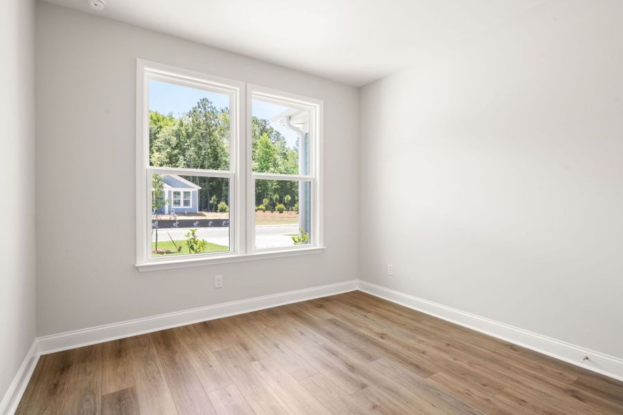 Spacious, unfurnished interior of a new home in Sun City Hilton Head, Bluffton (Image 11).