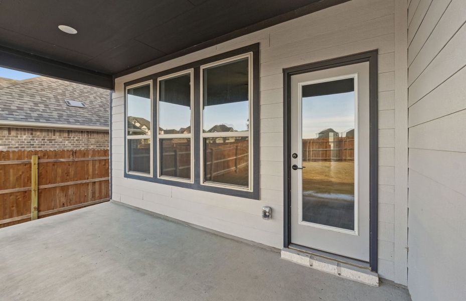 Exterior details and patio area of a home in Saddleback at Santa Rita Ranch, Liberty Hill (Image 28). Exterior details and patio area of a home in Saddleback at Santa Rita Ranch, Liberty Hill (Image 28).