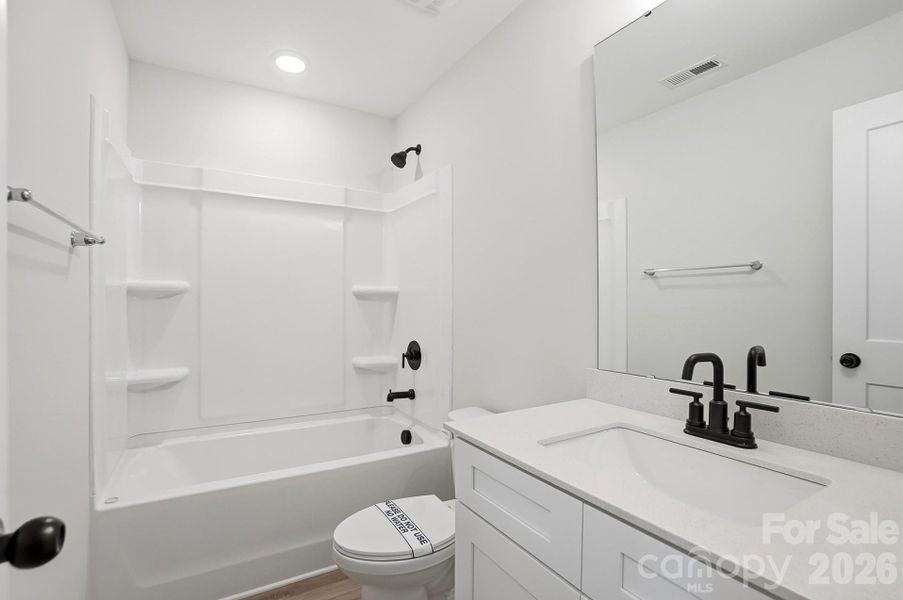 Furnished interior view inside a new home in , Waxhaw (Image 13).