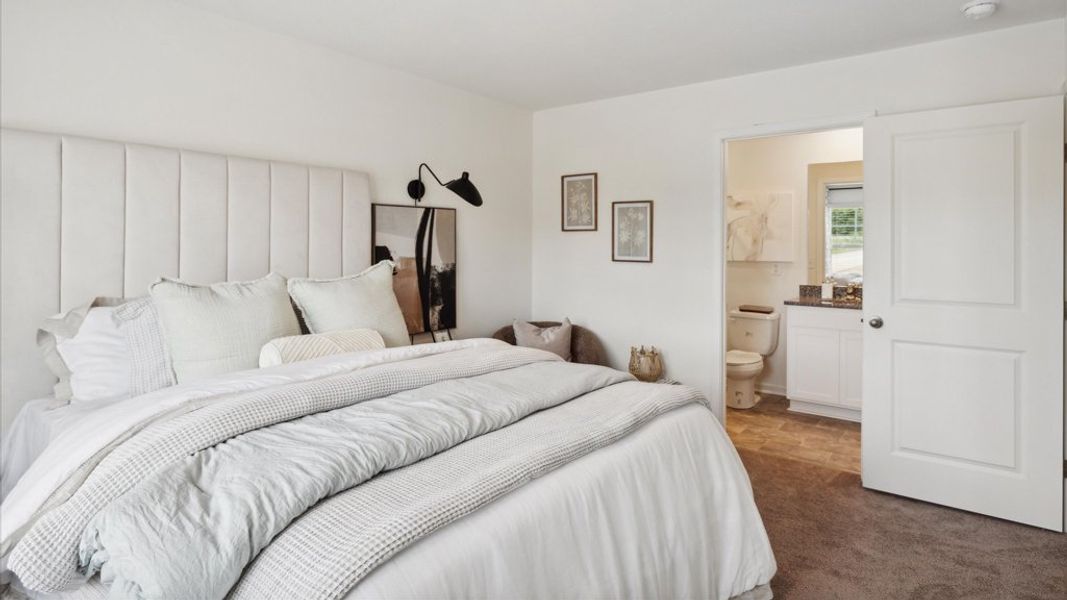 Representative furnished interior of a home built from the Altamont Townhome by D.R. Horton in Saint Marc's, Powell (Image 16).