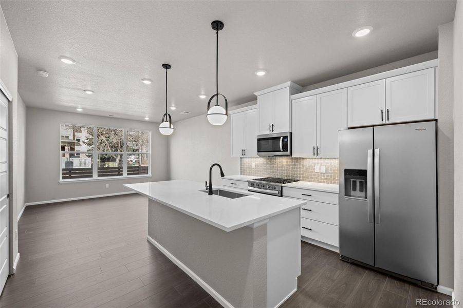 Furnished interior view inside a new home in Ralston Creek, Arvada (Image 9).