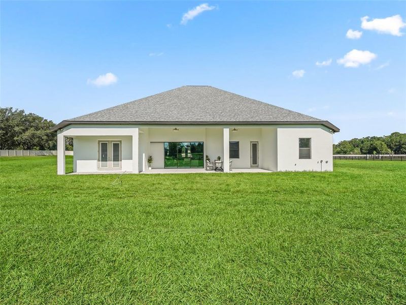 Exterior details and patio area of a home in , Ocala (Image 38).