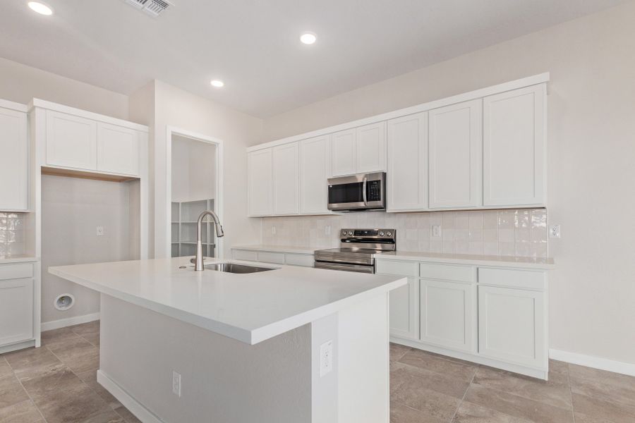 Furnished interior view inside a new home in Wildera, Queen Creek (Image 3).