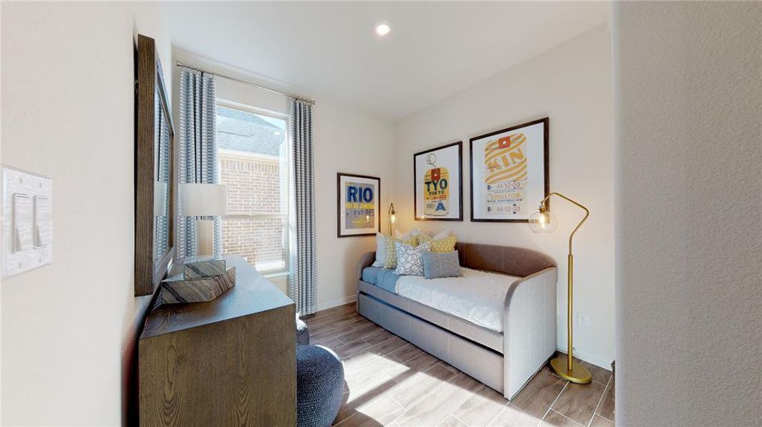 Sitting room featuring wood finish floors and recessed lighting