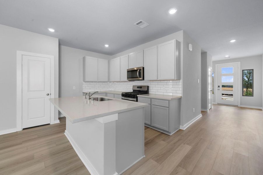 Furnished interior view inside a new home in Westridge Cove, Conroe (Image 8).
