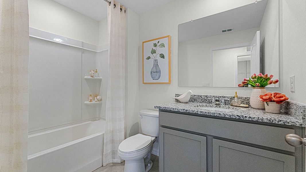 Furnished interior view inside a new home in Windrose, Apopka (Image 19).