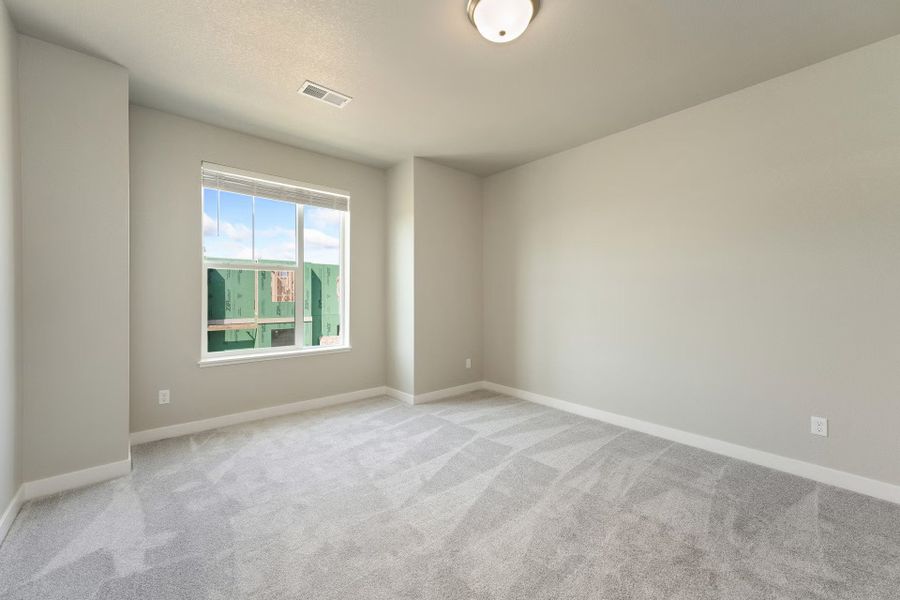 Spacious, unfurnished interior of a new home in The Lakes at Centerra - Discovery, Loveland (Image 25).