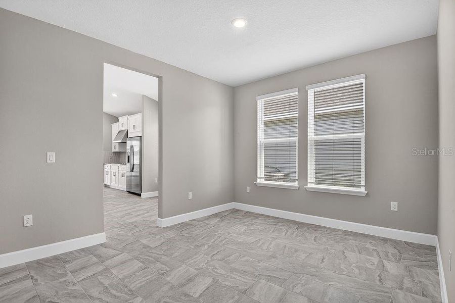 Spacious, unfurnished interior of a new home in Colbert Landings, Palm Coast (Image 27).