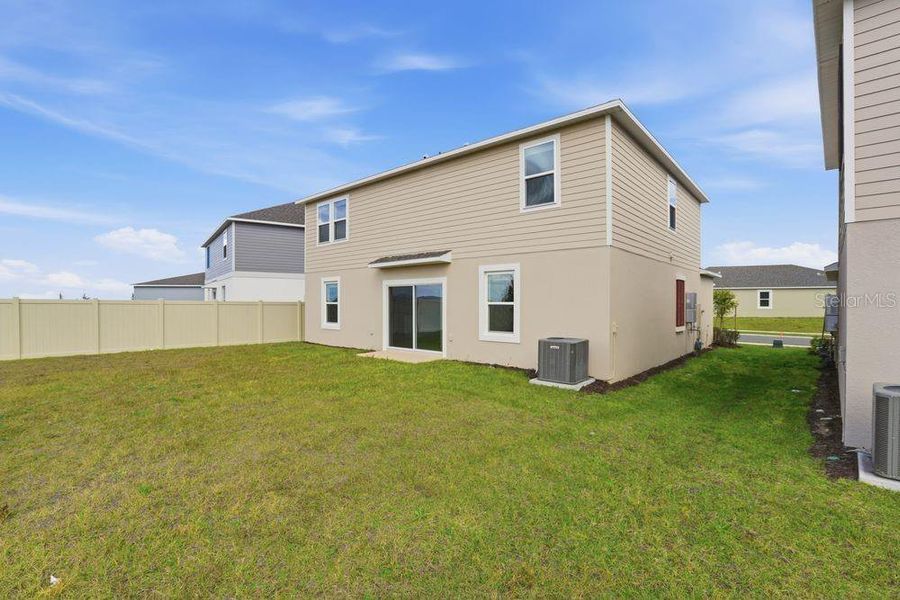 Exterior details and patio area of a home in Waterstone, Groveland (Image 4).