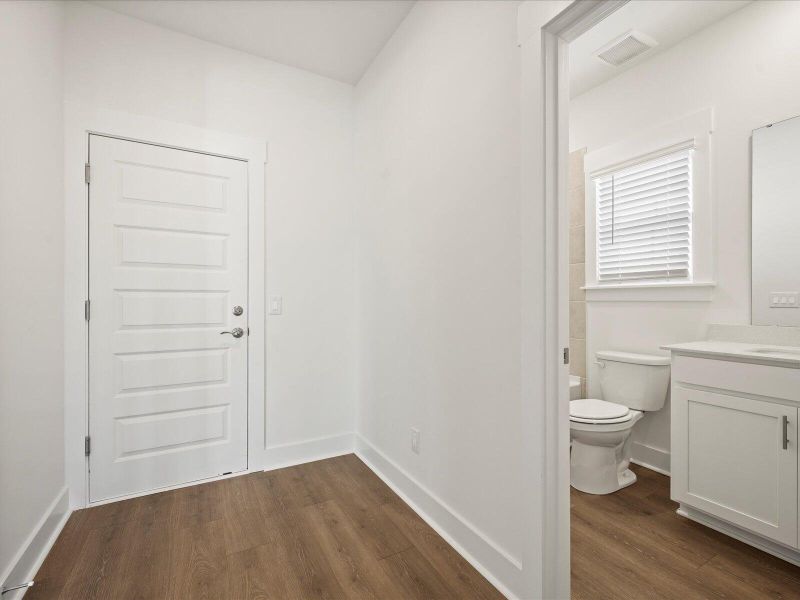 Spacious, unfurnished interior of a new home in The Coves at Lakes of Cane Bay, Summerville (Image 20).