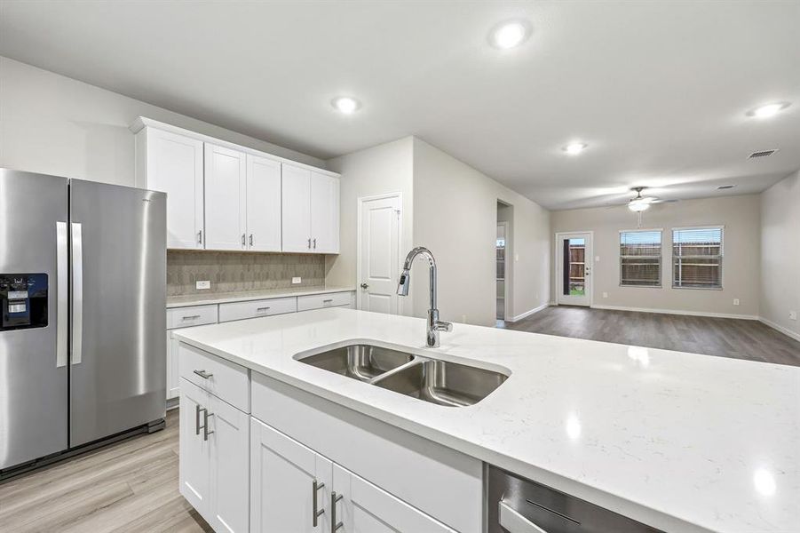 Furnished interior view inside a new home in Parks at Foster Crossing - Spring Series, Anna (Image 9).