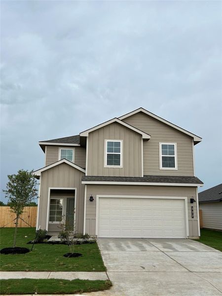 Front exterior of a new home in Cornerstone, Rockdale, TX, highlighting curb appeal (Image 2). Front exterior of a new home in Cornerstone, Rockdale, TX, highlighting curb appeal (Image 2).