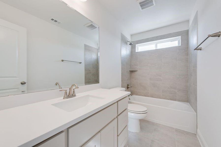 Furnished interior view inside a new home in Park Trails, Forney (Image 15).