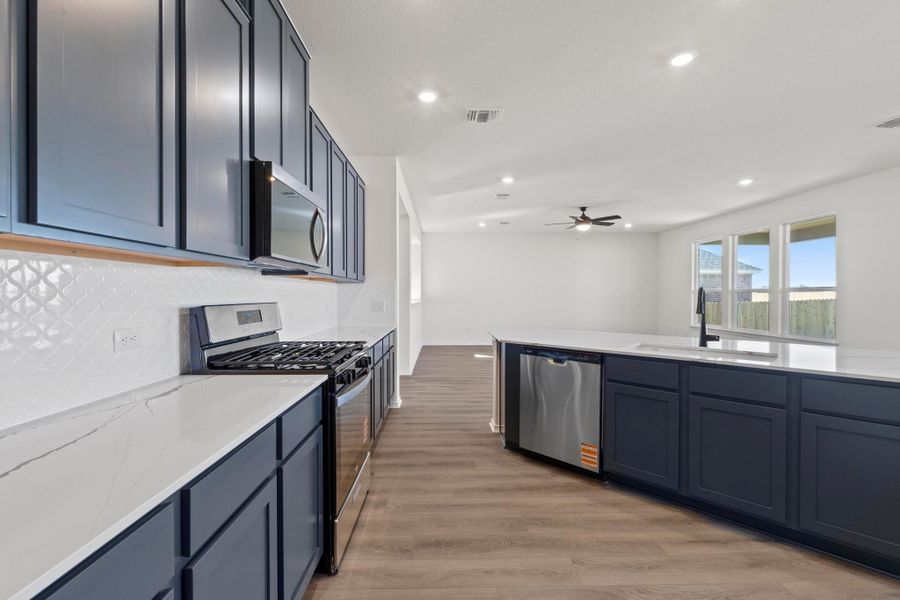 Furnished interior view inside a new home in Salerno - Classic Collection, Round Rock (Image 5). Furnished interior view inside a new home in Salerno - Classic Collection, Round Rock (Image 5).