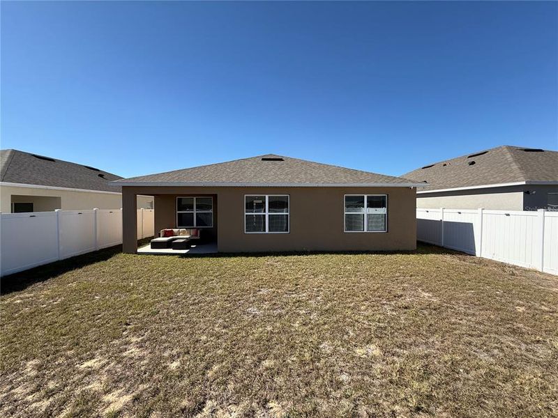 Exterior details and patio area of a home in Cypress Park Estates, Haines City (Image 28).