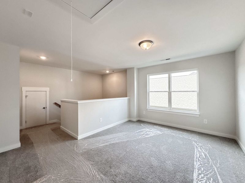 Spacious, unfurnished interior of a new home in The Paddock, Gallatin (Image 10).