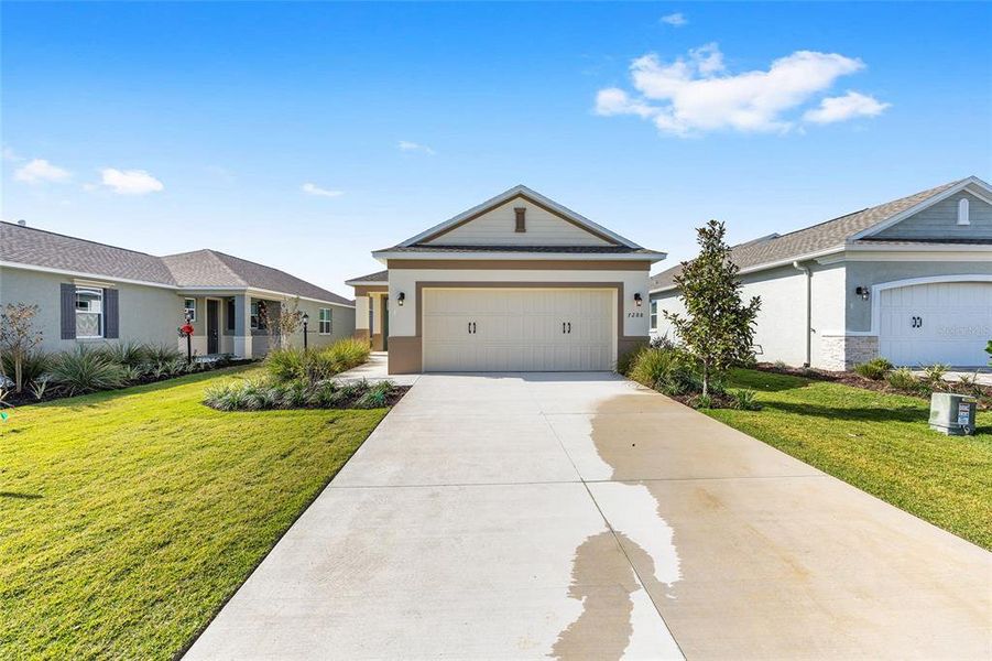 Front exterior of a new home in , Ocala, FL, highlighting curb appeal (Image 18).