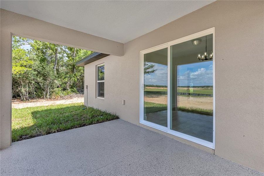 Exterior details and patio area of a home in , Ocala (Image 4).