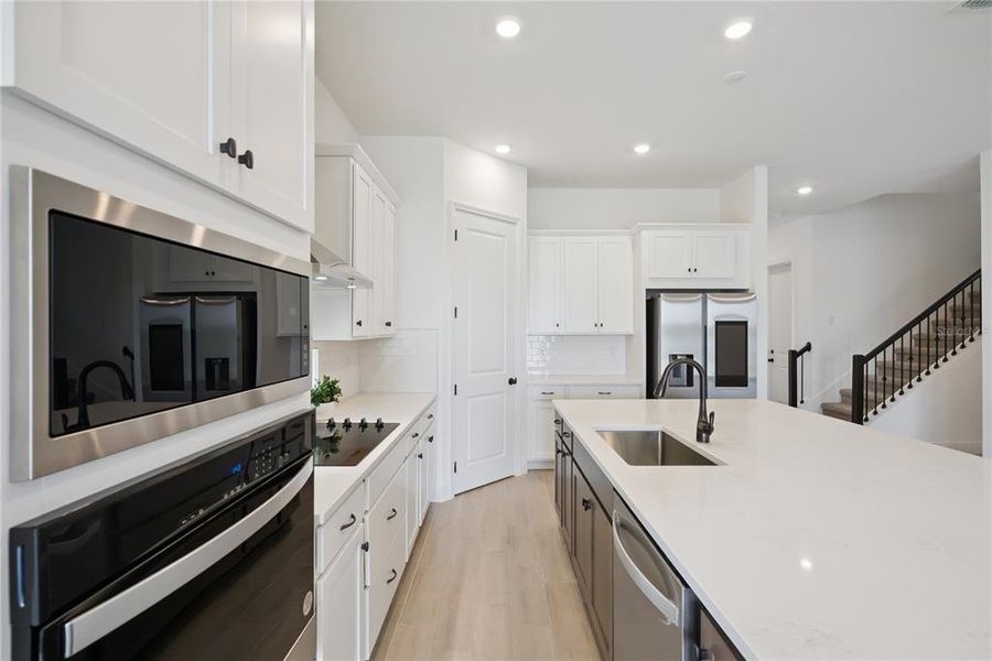 Furnished interior view inside a new home in Laureate Park, Orlando (Image 9).