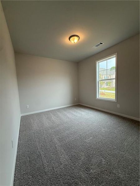 Spacious, unfurnished interior of a new home in Ponderosa Farms Reserve, Gainesville (Image 22).