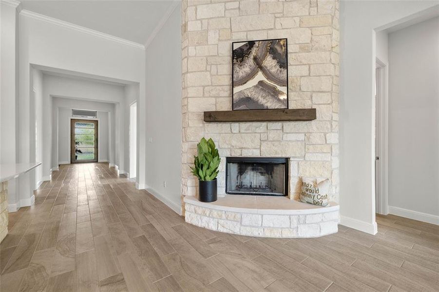 Elaborate Stone to Ceiling Wood Burning Fireplace with Hearth and Mantle