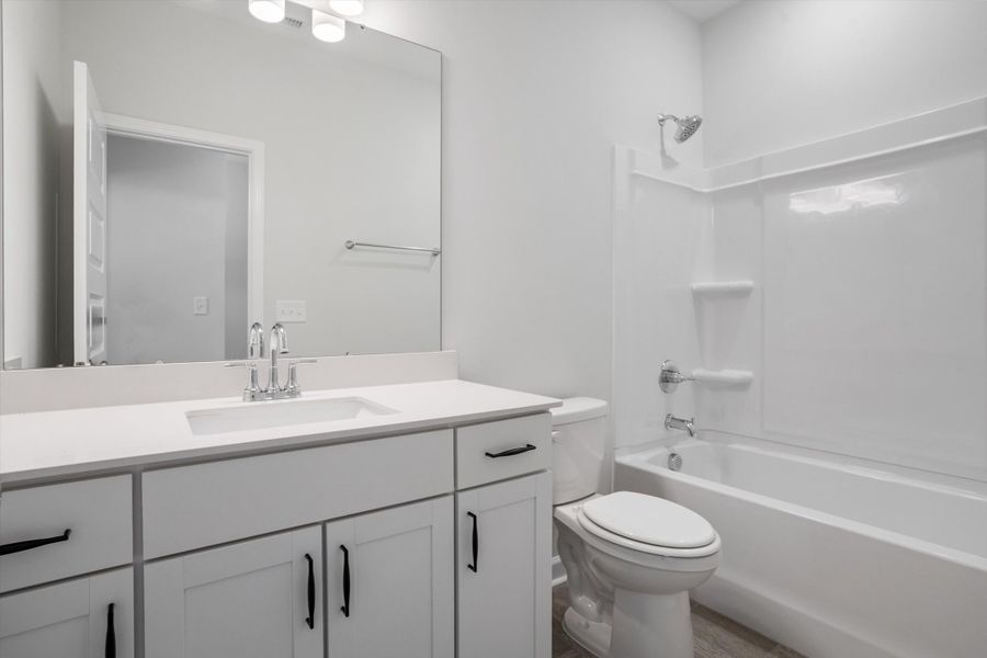Furnished interior view inside a new home in Ovation at Sweetbrier, Durham (Image 13).