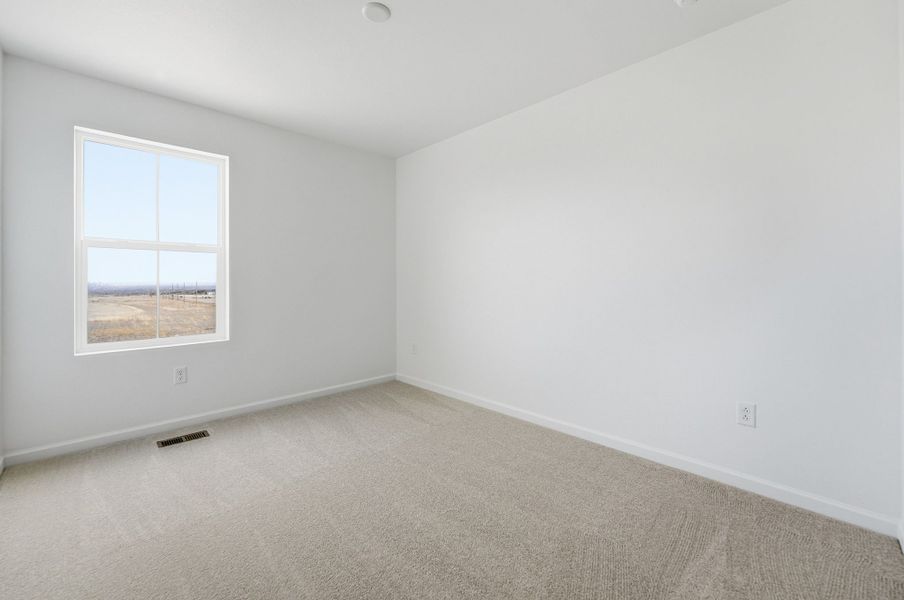Spacious, unfurnished interior of a new home in Trailstone, Arvada (Image 34).