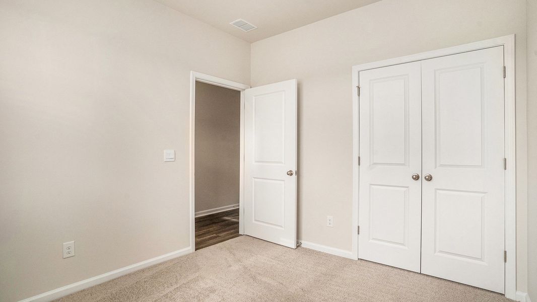 Spacious, unfurnished interior of a new home in Rich Square at Brunswick Plantation, Ash (Image 18). Spacious, unfurnished interior of a new home in Rich Square at Brunswick Plantation, Ash (Image 18).