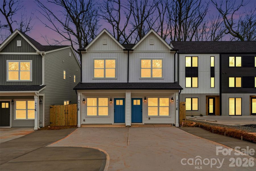 Front exterior of a new home in , Charlotte, NC, highlighting curb appeal (Image 22).