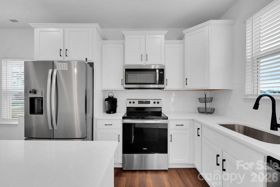 Furnished interior view inside a new home in , Wingate (Image 4).