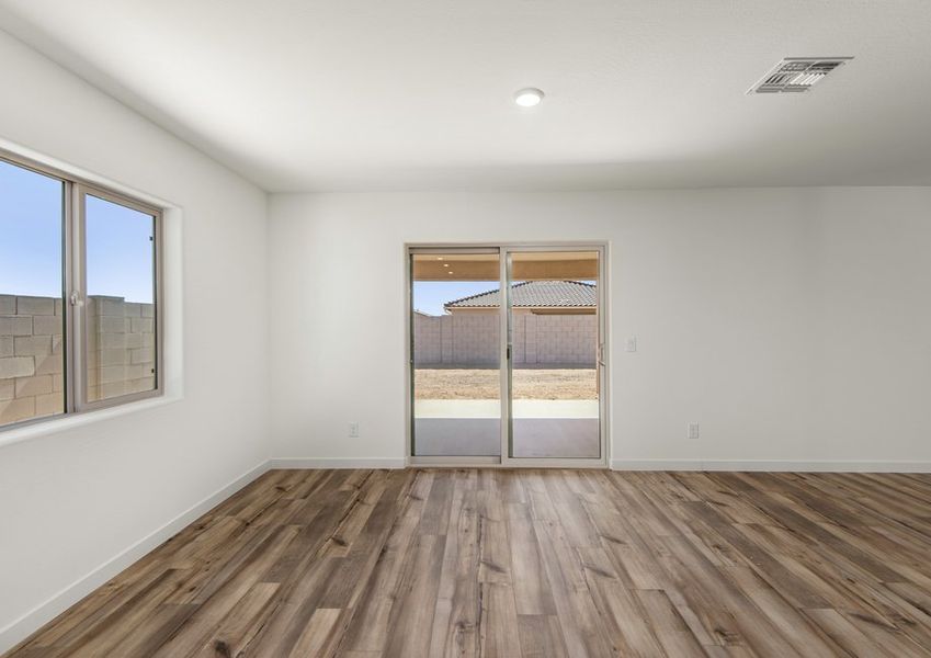 Beautiful sliding glass doors fill the space with natural lighting.