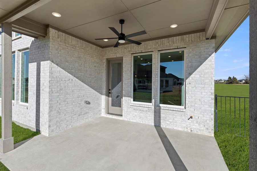 Exterior details and patio area of a home in Heath Golf and Yacht: Elegante' Series, Heath (Image 4).