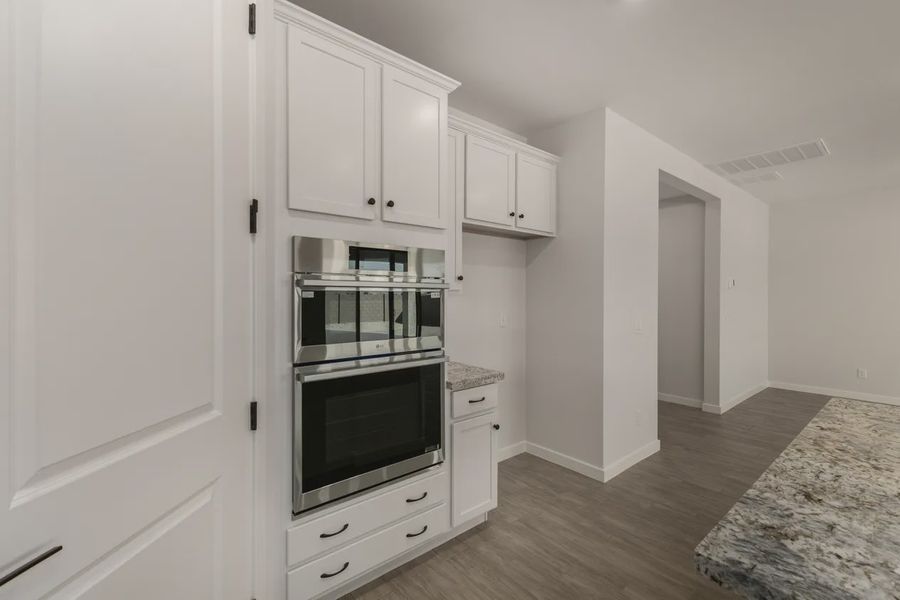 Furnished interior view inside a new home in Forté at Granite Vista, Waddell (Image 9).