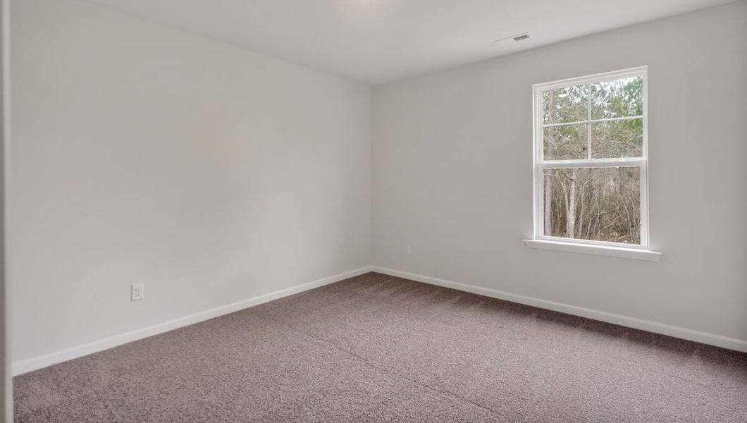 Representative unfurnished interior of a home built from the GLYNN by D.R. Horton in Grayson Park, Leland (Image 31).