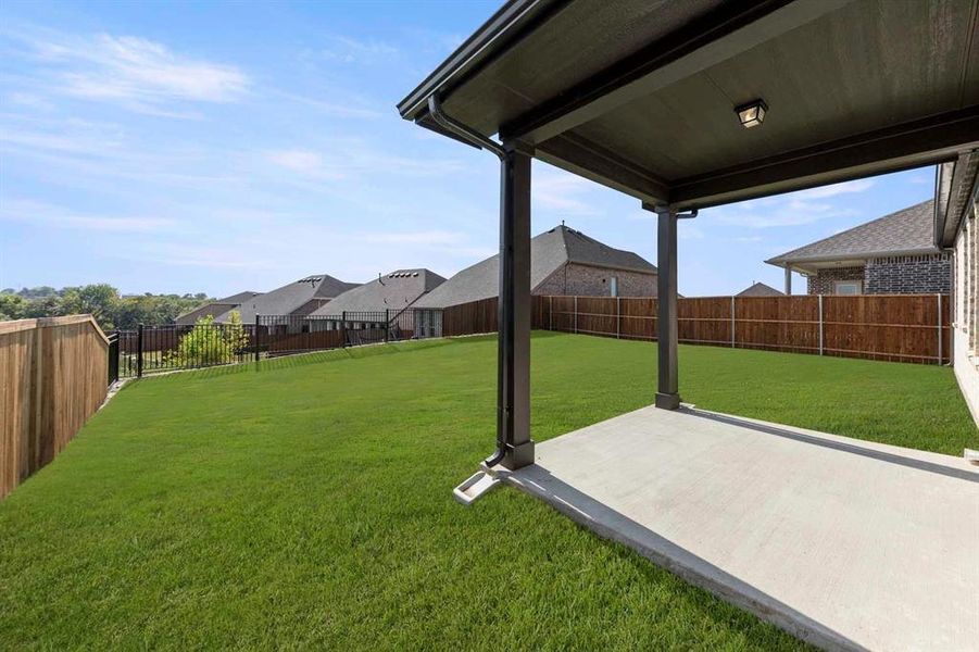 Exterior details and patio area of a home in Devonshire 50s, Forney (Image 4). Exterior details and patio area of a home in Devonshire 50s, Forney (Image 4).
