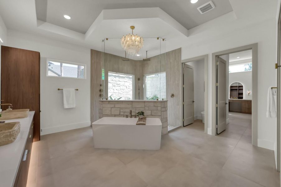 A spa-inspired bath offers a luxurious escape with refined finishes, generous space, and a calming, retreat-like atmosphere.