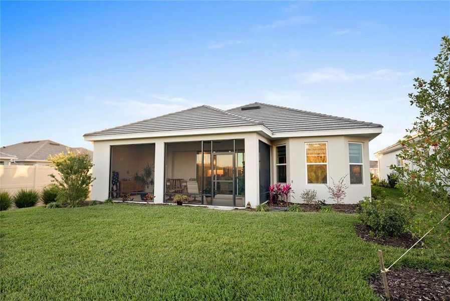 Exterior details and patio area of a home in Esplanade at Wiregrass Ranch, Wesley Chapel (Image 4).