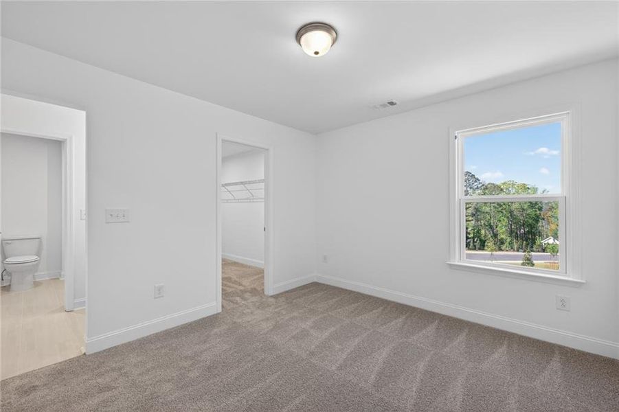 Spacious, unfurnished interior of a new home in Riversprings, Dacula (Image 32).