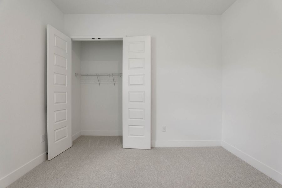 Representative unfurnished interior of a home built from the Hemingway by Rockwell Homes in Northlake At Ovation, Winter Garden (Image 20).