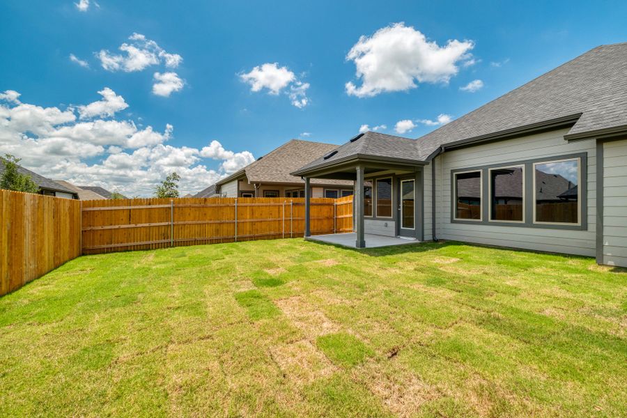 Exterior details and patio area of a home in Prairie Winds, Hutto (Image 18).
