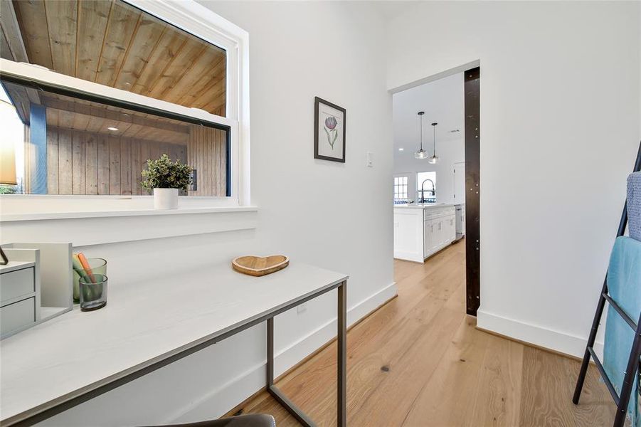 This photo was taken in another staged property with the same finishes and layout. Versatile space used as an office here.