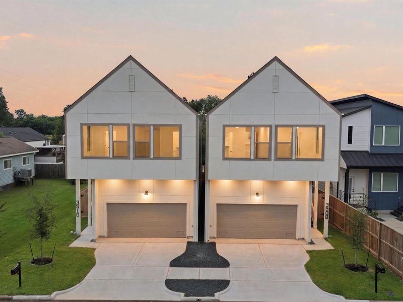 Front exterior of a new home in , Houston, TX, highlighting curb appeal (Image 25).
