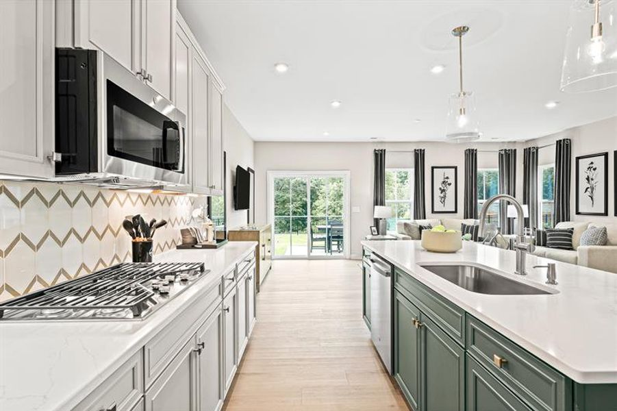 Representative furnished interior of a home built from the Roxbury Grande by Ryan Homes in Griffin Farm Townes, Pittsboro (Image 7).