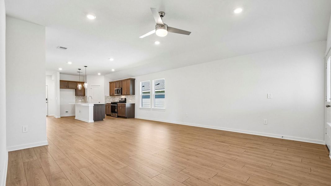 Spacious, unfurnished interior of a new home in Trails at Wildhorse, Austin (Image 18).