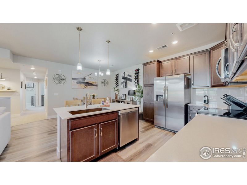 Quartz counters and soft close hinges added to all cabinetry in kitchen and bathrooms