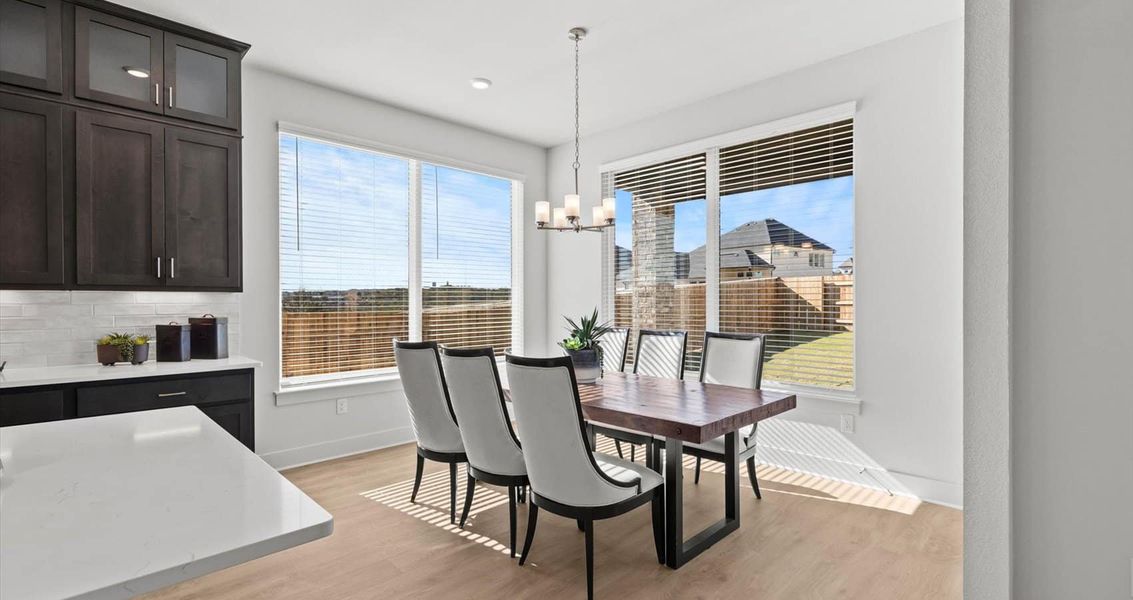 Representative furnished interior of a home built from the Waterloo by Chesmar Homes in Sunfield, Buda (Image 10).