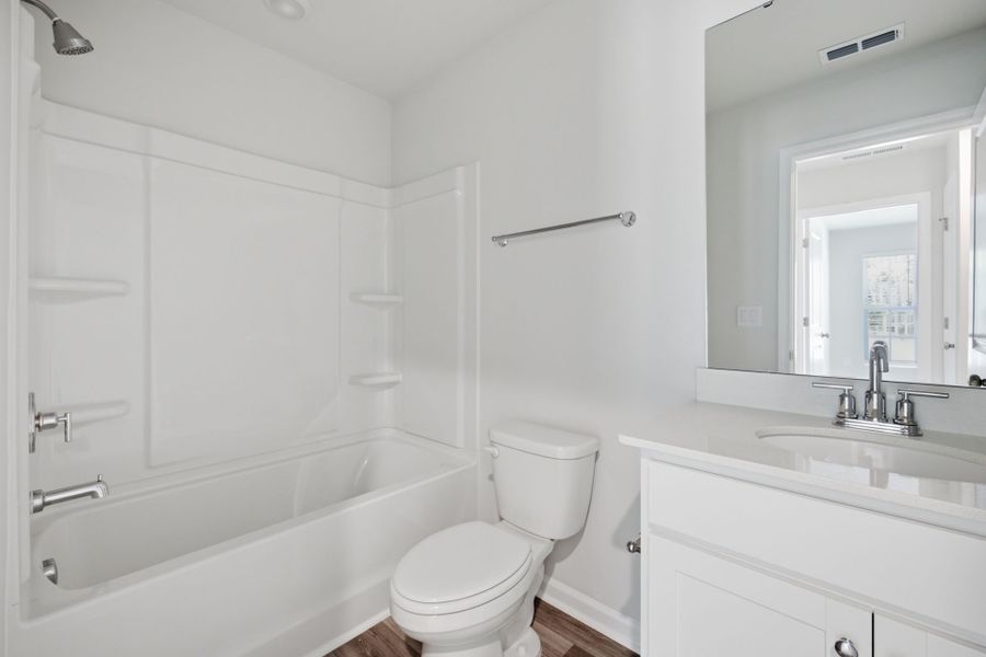 Furnished interior view inside a new home in Carpenter Falls, Durham (Image 10).