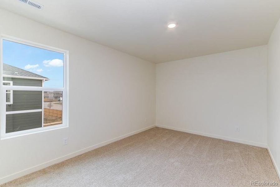 Spacious, unfurnished interior of a new home in Sky Ranch, Watkins (Image 23).